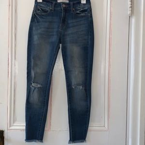 Dark blue ripped jeans